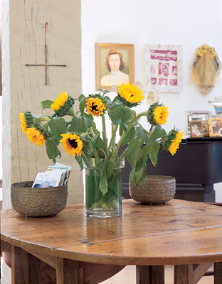 Casey’s interior design style is a fun mix of antiques and personal art.